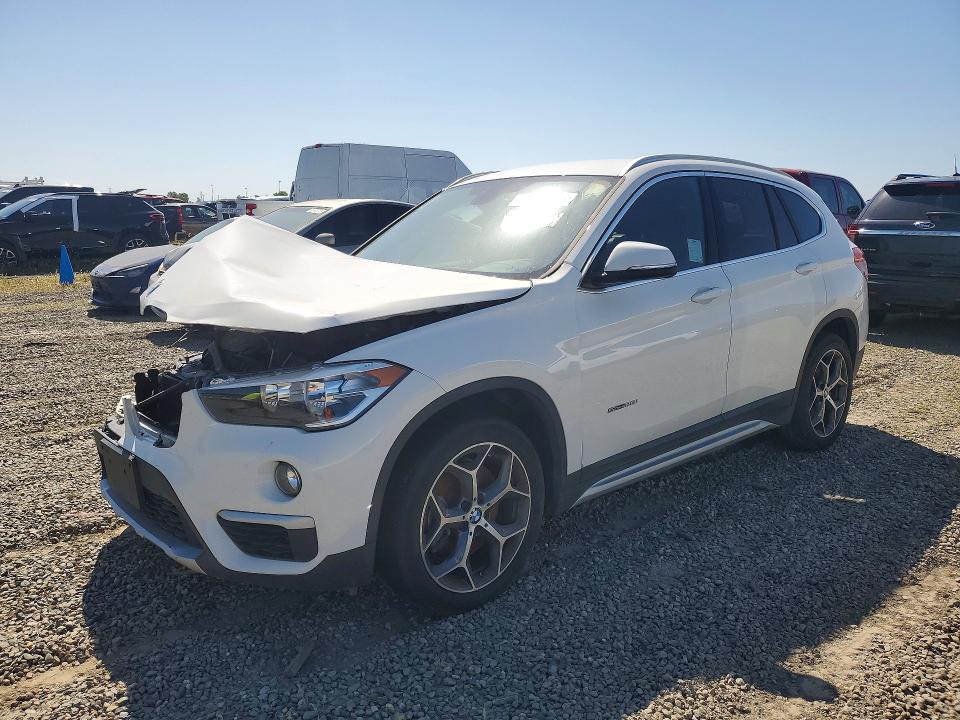 2018 BMW X1 VIN WBXHU7C34J5H40120 — COPART salvage auction photo