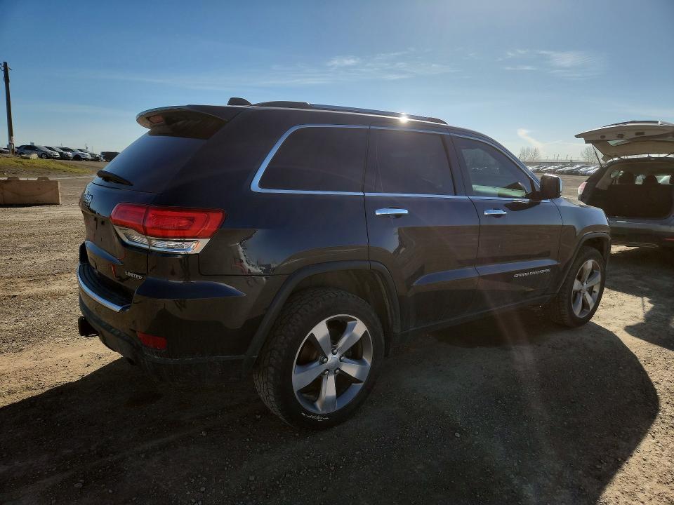 2014 Jeep VIN 1C4RJFBG2EC108787 COPART salvage auction — VANDALISM, Salvage Title, sold $3,200 on 2026-07-28 (photo 3)