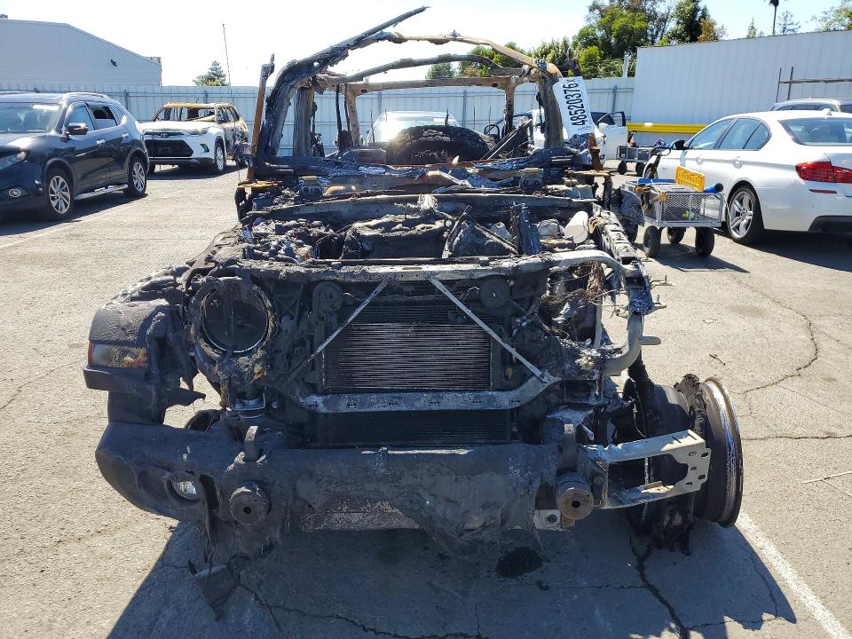 2018 Jeep Wrangler / VIN 1C4HJXDN1JW252580 COPART salvage auction — BURN, Ca - Non-Repairable Vehicle Cert, sold $800 on 2026-07-10 (photo 5)