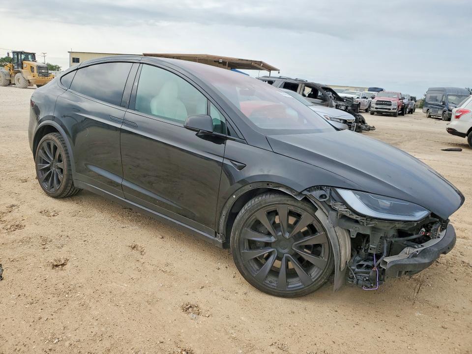 2023 Tesla Model x VIN 7SAXCBE52PF423179 COPART salvage auction — FRONT END, TX - CERTIFICATE OF TITLE, sold $17,300 on 2026-07-30 (photo 4)
