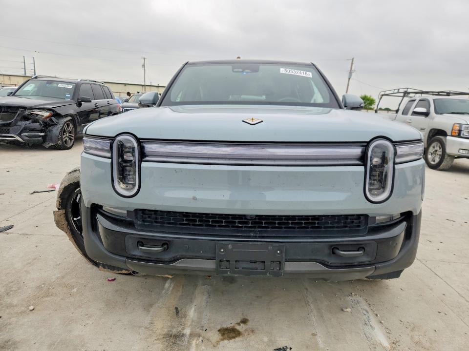 2026 Rivian R1s VIN 7PDSGFBA6TN082331 COPART salvage auction — FRONT END, TX - SALVAGE VEHICLE TITLE, sold $10,000 on 2026-07-31 (photo 5)