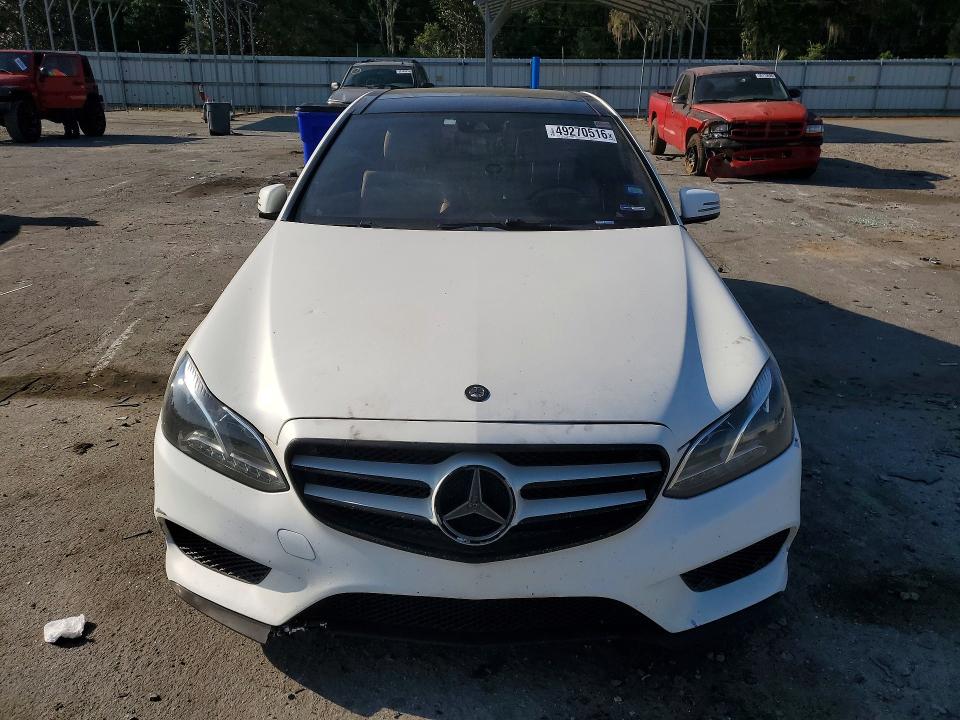 2016 Mercedes-benz E-klasse VIN WDDHF5KB0GB283419 COPART salvage auction — WATER/FLOOD, Tx - Salvage Title-Flood Damage, sold $1,650 on 2026-07-16 (photo 5)