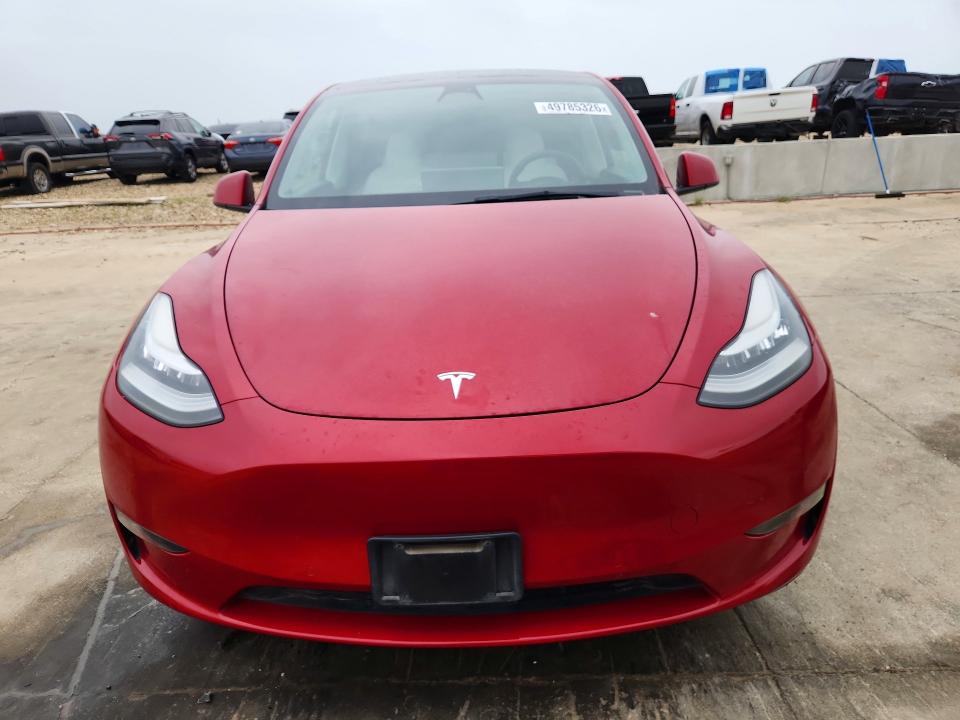 2021 Tesla Model y VIN 5YJYGDEE6MF230773 COPART salvage auction — SIDE, Tx - Salvage Vehicle Title, sold $14,100 on 2026-07-20 (photo 5)