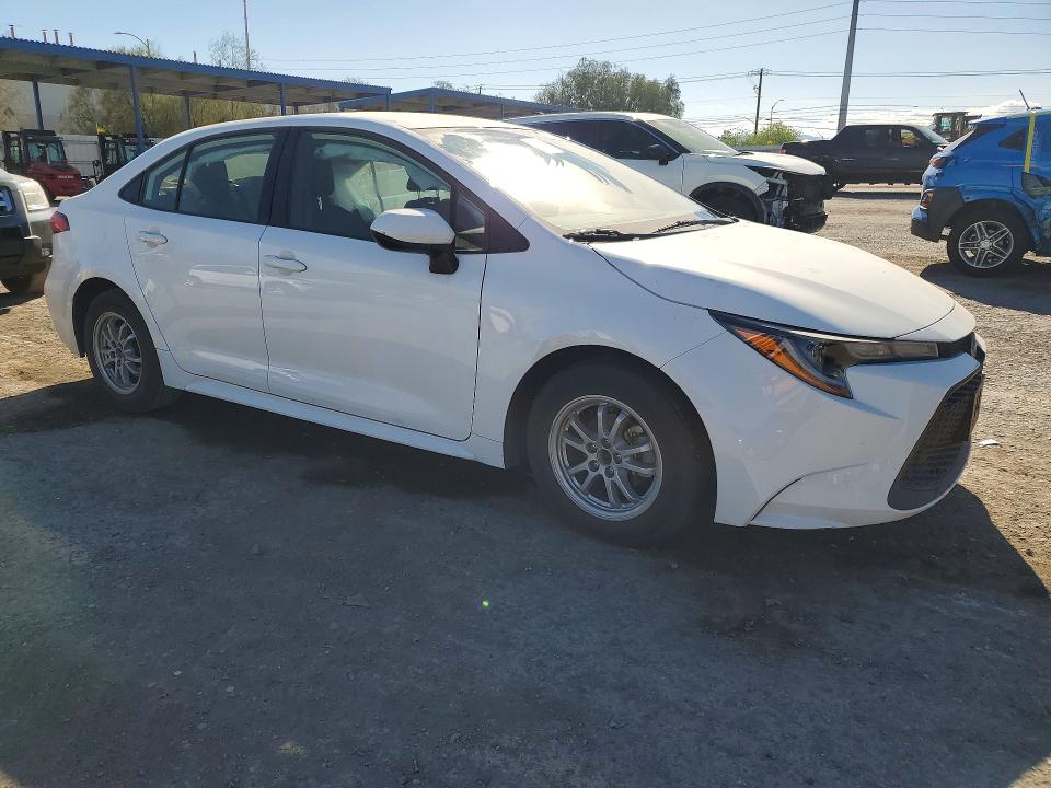 2022 Toyota Corolla VIN JTDEAMDE2N3014097 COPART salvage auction — SIDE, Nv - Salvage Title, sold $5,100 on 2026-07-02 (photo 4)