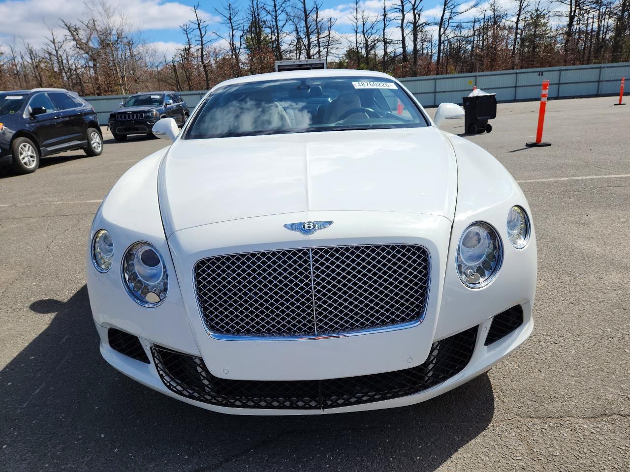2012 Bentley Continental gt VIN SCBFR7ZAXCC071524 COPART salvage auction — Minor Dent/Scratches, NY - CERT OF TITLE-REBUILT SALVAGE (P), sold $17,000 on 2026-04-27 (photo 5)