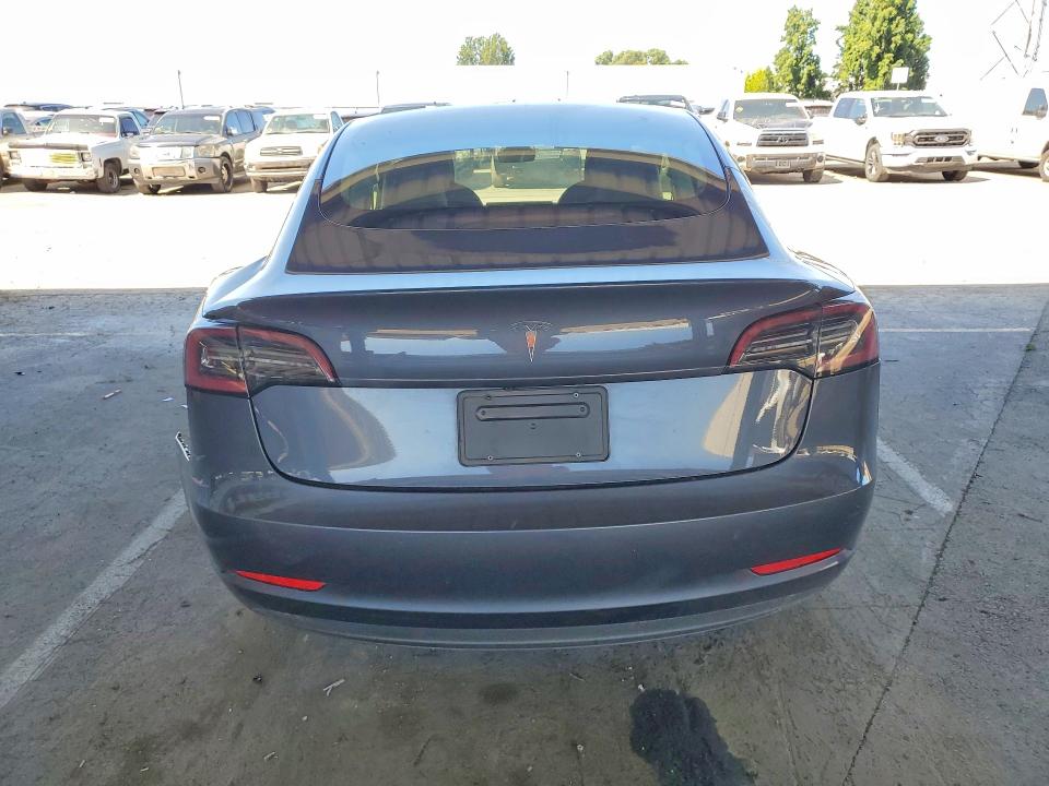2023 Tesla VIN 5YJ3E1EA8PF447337 COPART salvage auction — REAR END, FL - CERTIFICATE OF DESTRUCTION, sold $5,800 on 2026-07-06 (photo 6)