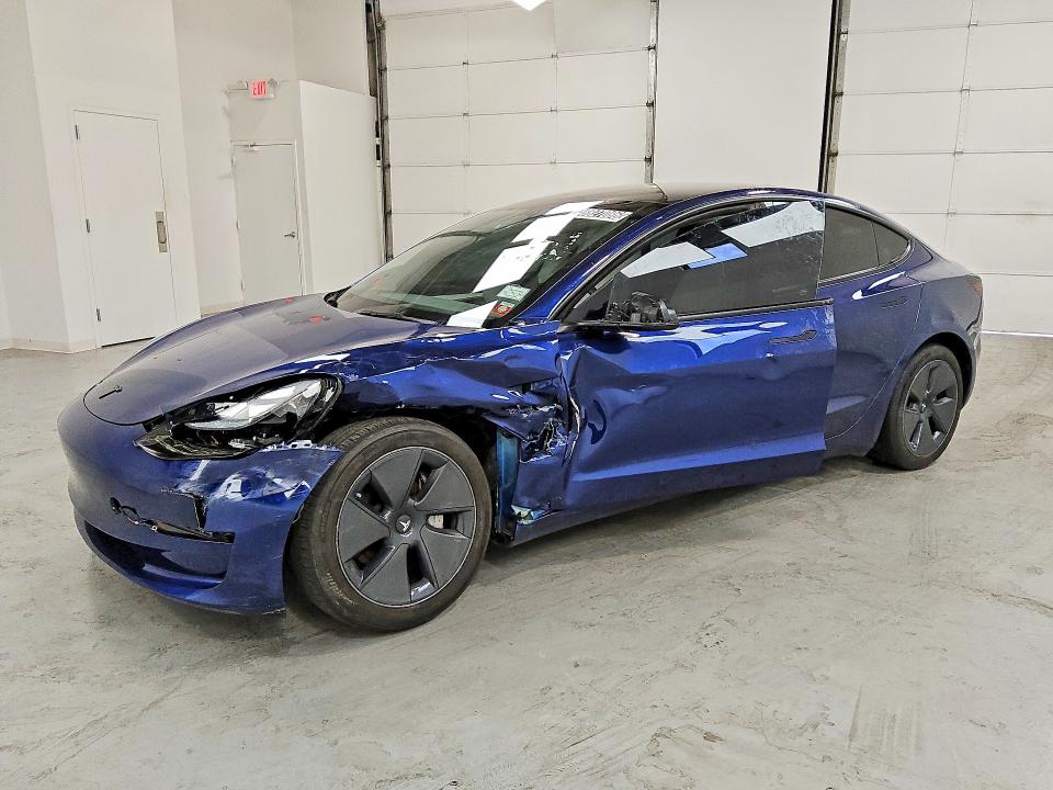 2023 Tesla Model 3 VIN 5YJ3E1EA9PF665190 COPART salvage auction — SIDE, IN - CERTIFICATE OF TITLE, sold $9,000 on 2026-07-23 (photo 1)