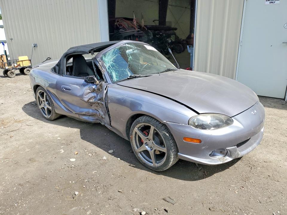 2004 Mazda Mx-5 VIN JM1NB354440407385 COPART salvage auction — SIDE, Vt - Cert Of Title-Salvage Vehicle, sold $3,100 on 2026-07-13 (photo 4)