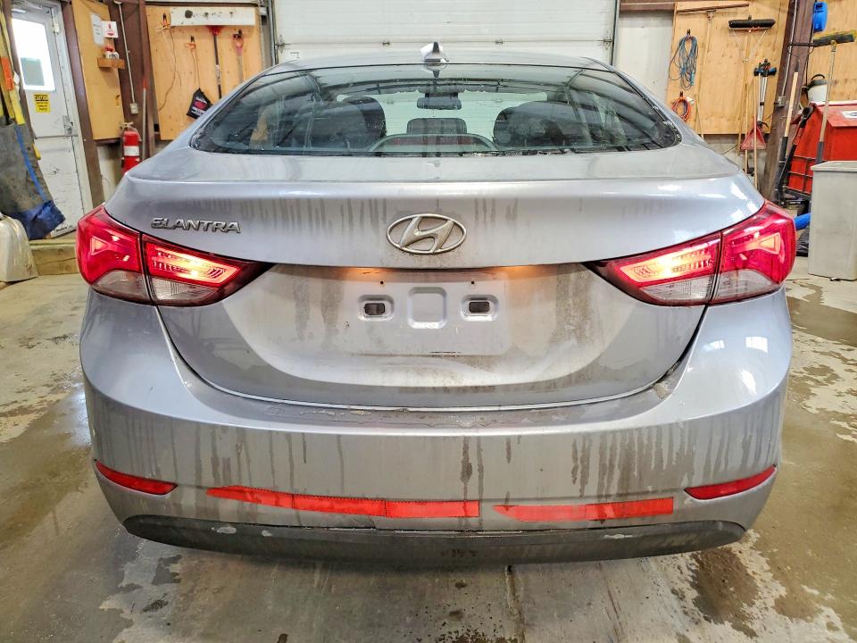 2016 Hyundai Elantra VIN 5NPDH4AE7GH697885 COPART salvage auction — SIDE, Salvage Title, sold $2,100 on 2026-07-09 (photo 6)