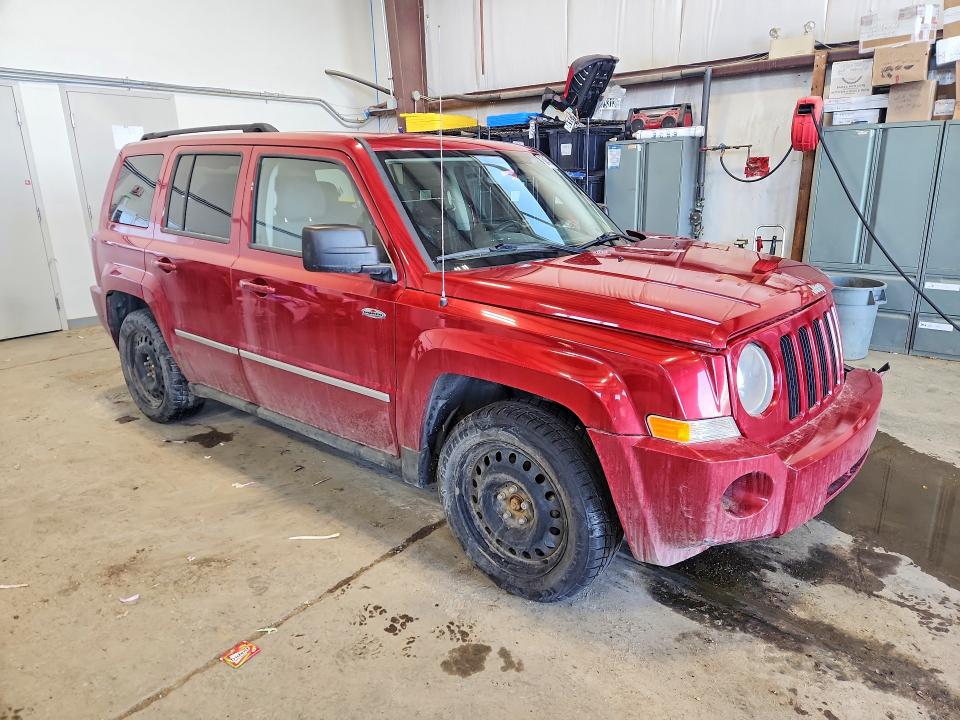 2010 Jeep Patriot VIN 1J4NF2GBXAD631561 COPART salvage auction — FRONT END, AB - BOS - SALVAGE, sold $475 on 2026-07-02 (photo 4)
