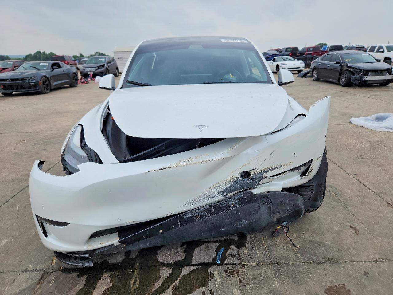 2022 Tesla Model Y VIN 7SAYGDEF0NF452268 COPART salvage auction — Front End, TX - CERTIFICATE OF TITLE, sold $6,900 on 2026-07-09 (photo 5)
