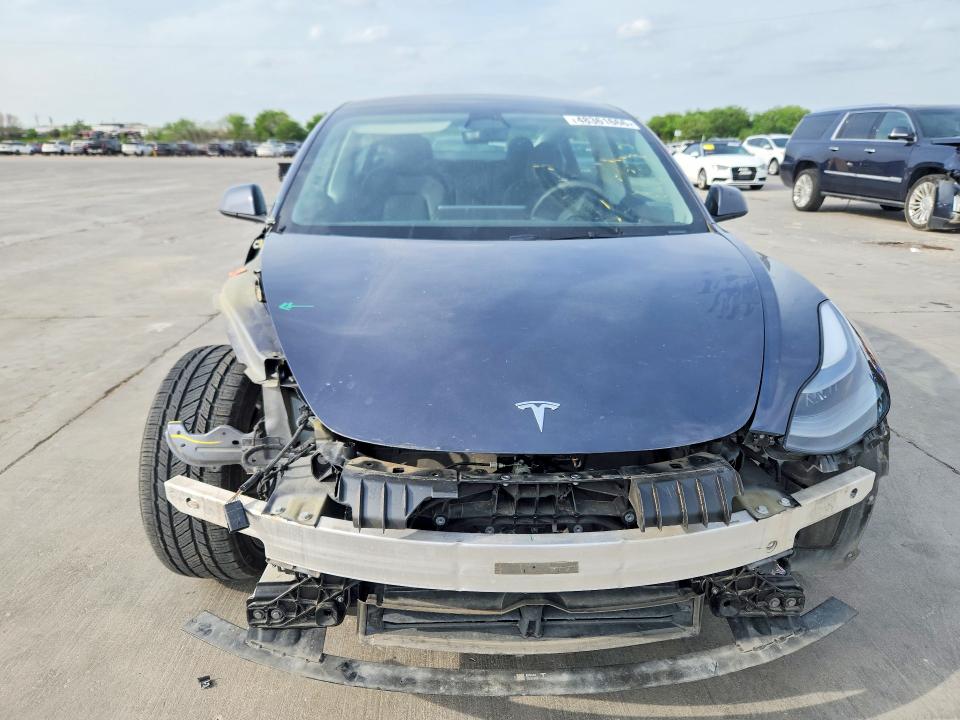 2023 Tesla Model 3 VIN 5YJ3E1EA0PF645670 COPART salvage auction — FRONT END, TX - SALVAGE VEHICLE TITLE, sold $700 on 2026-07-27 (photo 5)