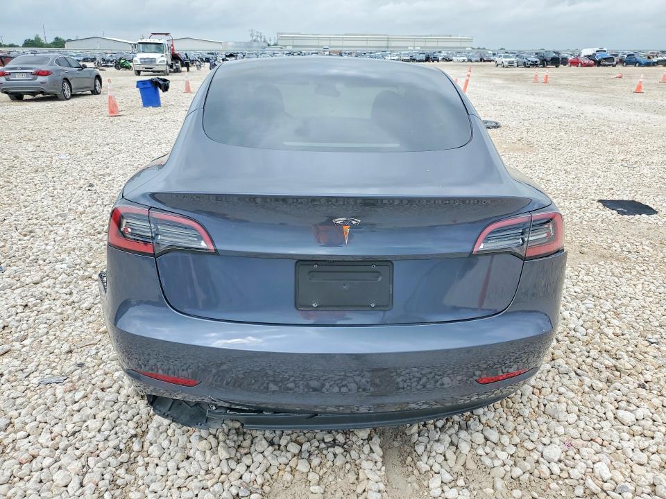 2023 Tesla Model 3 VIN 5YJ3E1EA4PF695178 COPART salvage auction — SIDE, TX - SALVAGE VEHICLE TITLE, sold $3,450 on 2026-07-02 (photo 6)