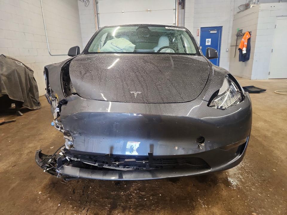 2023 Tesla Model y VIN 7SAYGDEE2PF610247 COPART salvage auction — FRONT END, Il - Salvage Certificate, sold $7,300 on 2026-07-29 (photo 5)