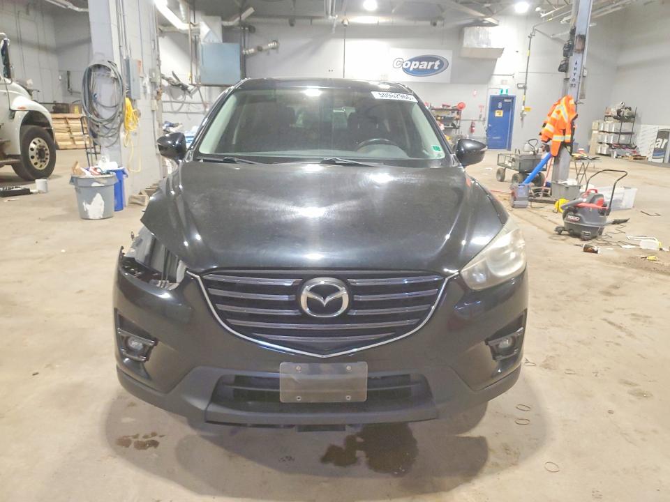 2016 Mazda Cx-5 VIN JM3KE2CY7G0815109 COPART salvage auction — SIDE, NS - SALVAGE TITLE, sold $3,100 on 2026-07-09 (photo 5)