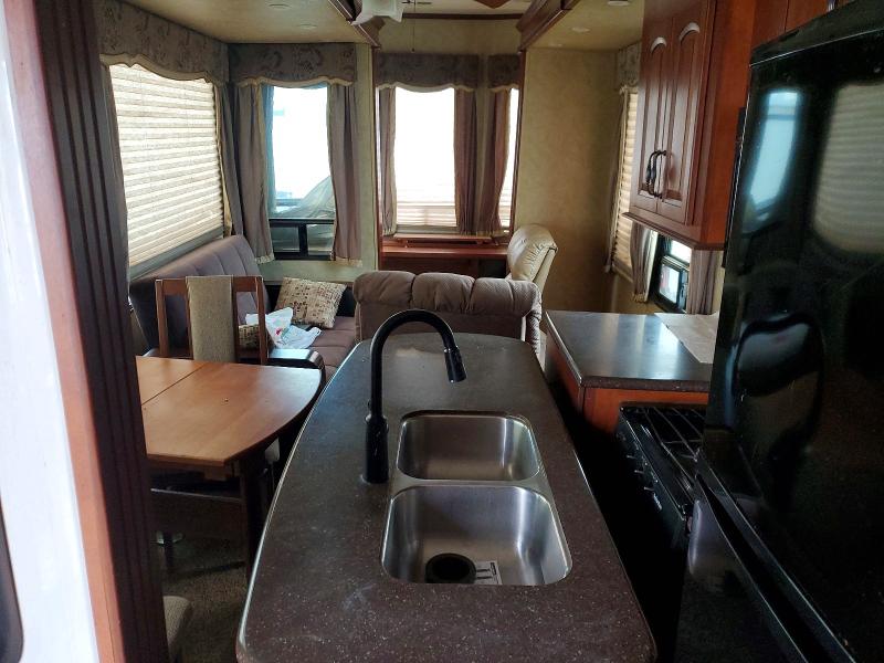 2012 Cedar creek VIN 4X4TCRS23CS206987 COPART salvage auction — SIDE, IN - CERT OF TITLE-SALVAGE TITLE, sold $4,000 on 2026-07-09 (photo 6)