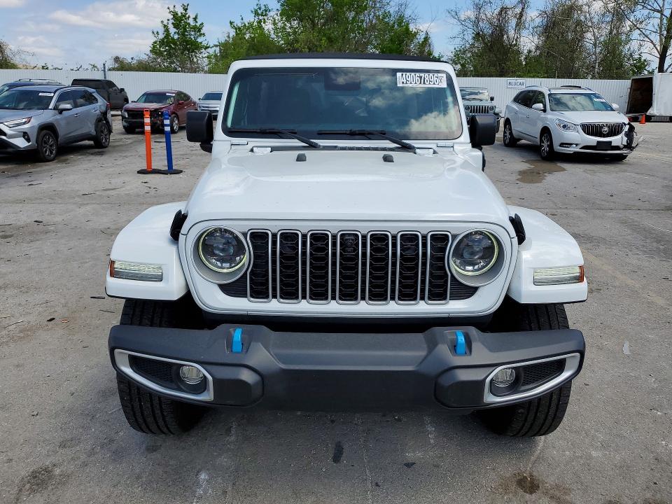 2024 Jeep Wrangler / VIN 1C4RJXP60RW202922 COPART salvage auction — MINOR DENT/SCRATCHES, MO - CERTIFICATE OF TITLE, sold $11,600 on 2026-07-09 (photo 5)