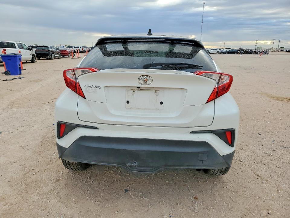 2019 Toyota C-hr VIN NMTKHMBX0KR100634 COPART salvage auction — SIDE, Tx - Salvage Vehicle Title, sold $5,500 on 2026-07-08 (photo 6)