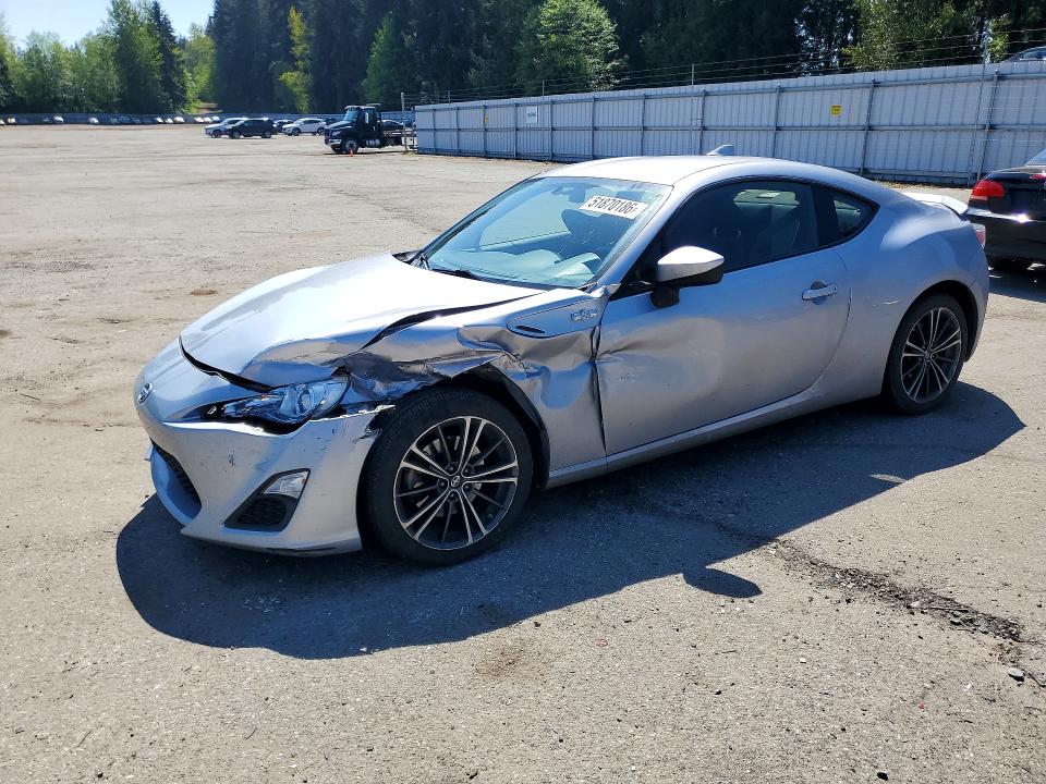2016 Scion VIN JF1ZNAA14G9703764 COPART salvage auction — FRONT END, Salvage Title, sold $1,050 on 2026-07-13 (photo 1)