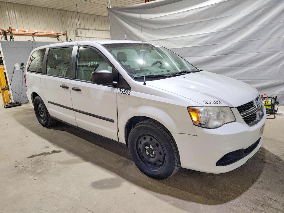 2014 Dodge Caravan VIN 2C4RDGBG7ER462440 COPART salvage auction — NORMAL WEAR, Salvage Title, sold $325 on 2026-09-10 (photo 4)
