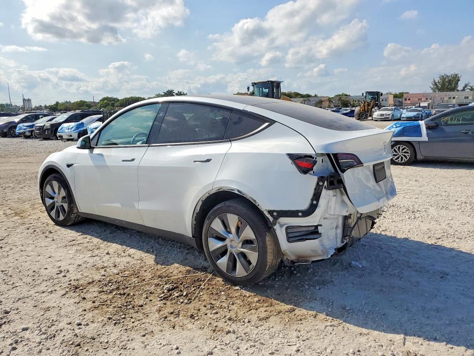 2023 Tesla Model y VIN 7SAYGDEE7PF880185 COPART salvage auction — REAR END, FL - CERT OF TITLE SLVG REBUILDABLE, sold $9,100 on 2026-07-28 (photo 2)