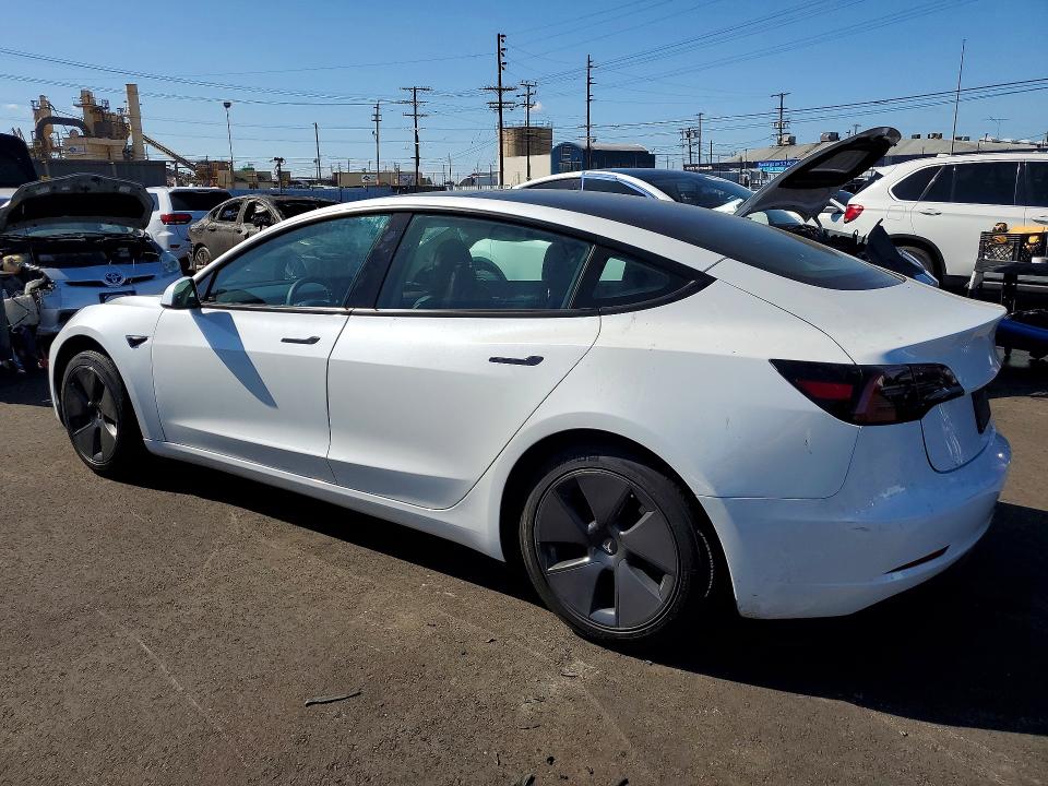 2023 Tesla Model 3 VIN 5YJ3E1EBXPF695517 COPART salvage auction — REAR END, Salvage Title, sold $9,200 on 2026-07-15 (photo 2)