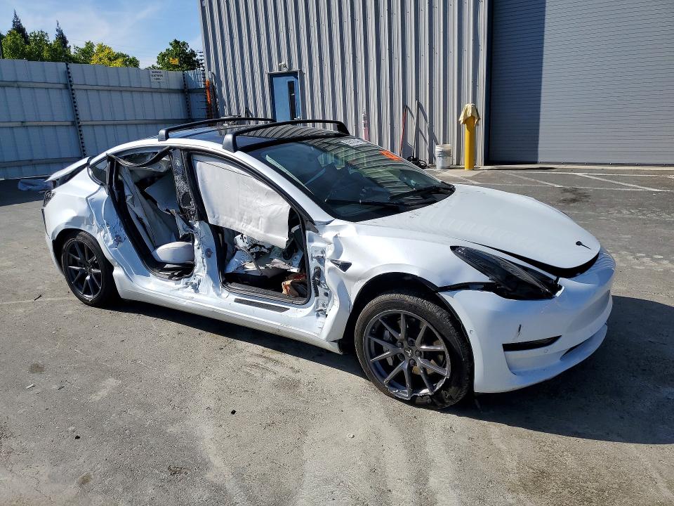 2022 Tesla Model 3 VIN 5YJ3E1EA7NF374670 COPART salvage auction — SIDE, Salvage Title, sold $2,700 on 2026-07-16 (photo 4)