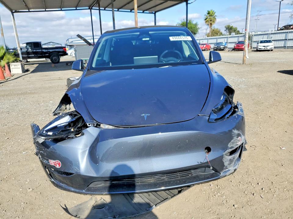 2023 Tesla VIN 7SAYGAEE4PF965449 COPART salvage auction — FRONT END, Ca - Salvage Certificate, sold $7,000 on 2026-07-24 (photo 5)
