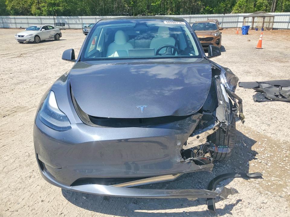 2023 Tesla Model y VIN 7SAYGDEE3PA185036 COPART salvage auction — FRONT END, Nc - Salvage Certificate Of Title, sold $12,100 on 2026-07-17 (photo 5)