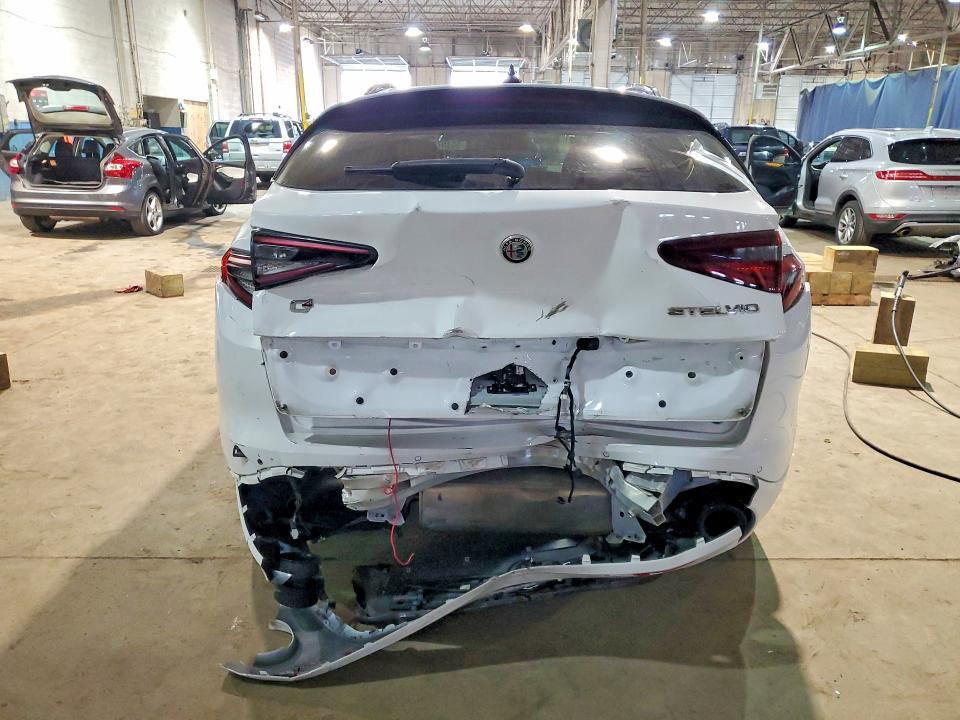 2023 Alfa romeo Stelvio VIN ZASPAKBN4P7D57013 COPART salvage auction — REAR END, Mi - Scrap Certificate Of Title, sold $11,600 on 2026-07-14 (photo 6)