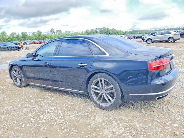 2015 Audi A8 VIN WAU32AFDXFN028193 COPART salvage auction — SIDE, Tx - Salvage Vehicle Title, sold $2,200 on 2026-07-15 (photo 2)