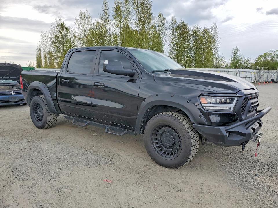 2021 Ram 1500 VIN 1C6SRFJT9MN623305 COPART salvage auction — FRAME DAMAGE, Salvage Title, sold $13,600 on 2026-08-03 (photo 4)
