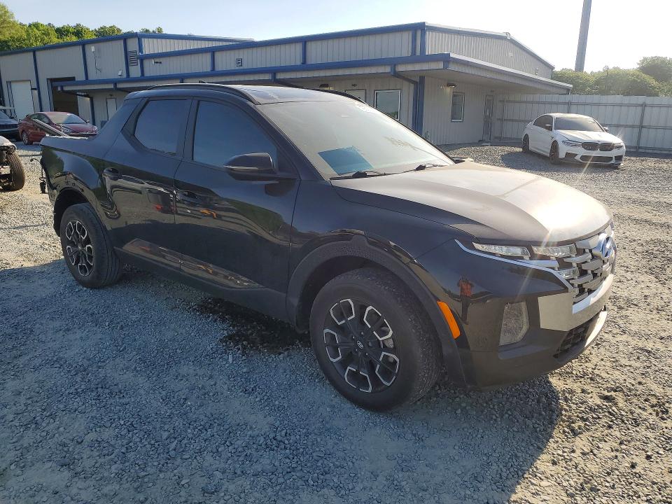 2023 Hyundai Santa cruz VIN 5NTJDDAF8PH062389 COPART salvage auction — REAR END, NC - SALVAGE CERTIFICATE OF TITLE, sold $5,400 on 2026-07-23 (photo 4)
