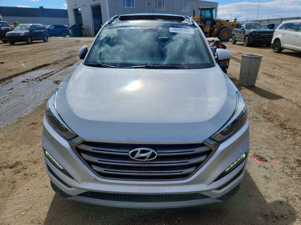 2017 Hyundai Tucson VIN KM8J3CA28HU450315 COPART salvage auction — VANDALISM, AB - BOS - SALVAGE, sold $6,700 on 2026-07-16 (photo 5)