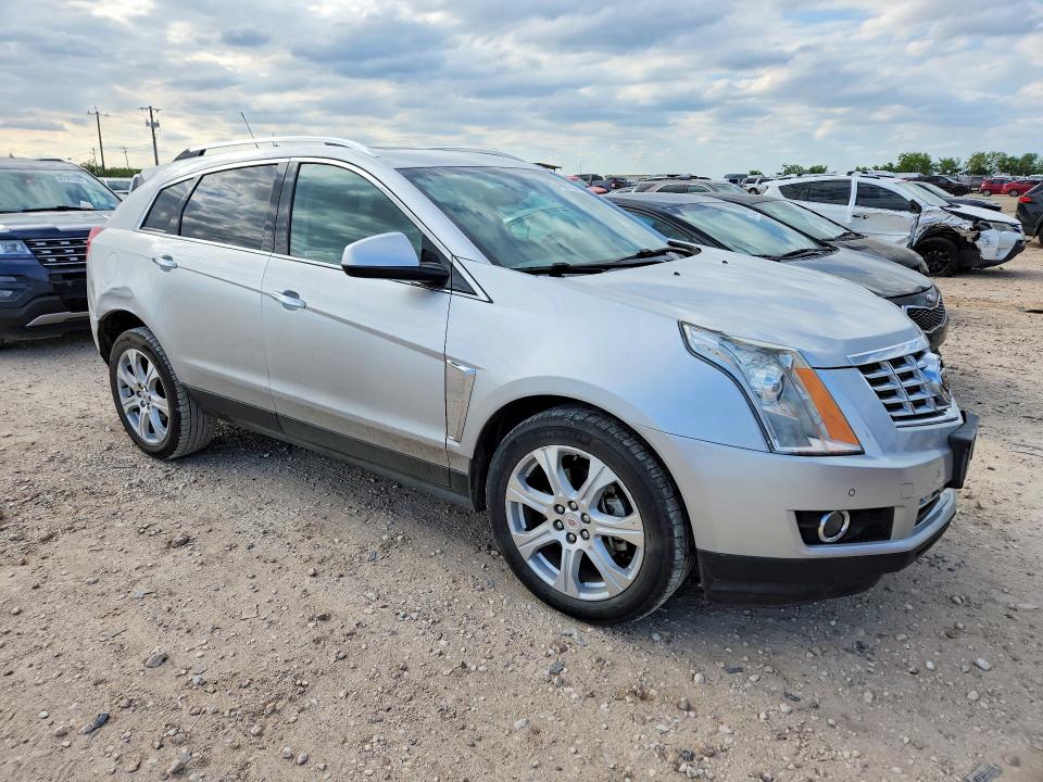 2016 Cadillac Srx VIN 3GYFNCE31GS578007 COPART salvage auction — MINOR DENT/SCRATCHES, Tx - Salvage Vehicle Title, sold $2,200 on 2026-07-02 (photo 4)