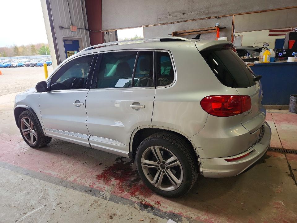 2017 Volkswagen Tiguan VIN WVGTV7AX7HK019420 COPART salvage auction — SIDE, Salvage Title, sold $2,150 on 2026-08-10 (photo 2)