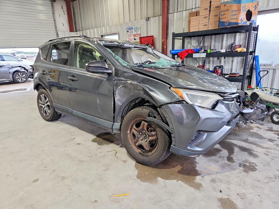 2016 Toyota Rav 4 VIN JTMZFREV7GD084951 COPART salvage auction — ROLLOVER, La - Certificate Of Destruction, sold $1,550 on 2026-07-22 (photo 4)