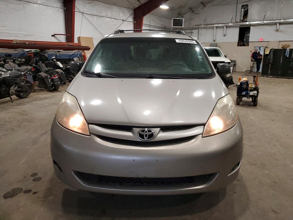 2010 Toyota Sienna VIN 5TDKK4CC8AS316857 COPART salvage auction — REAR END, TX - SALVAGE VEHICLE TITLE, sold $1,850 on 2026-07-13 (photo 5)