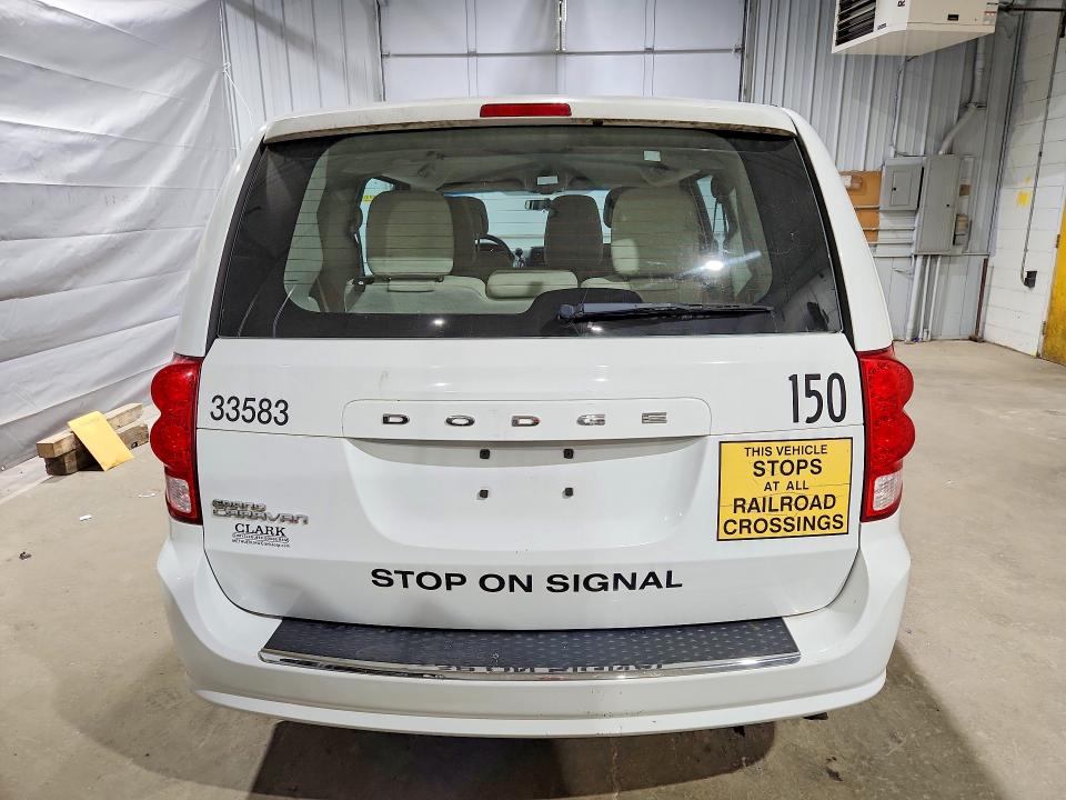 2014 Dodge Caravan VIN 2C4RDGBG7ER462440 COPART salvage auction — NORMAL WEAR, Salvage Title, sold $325 on 2026-09-10 (photo 6)