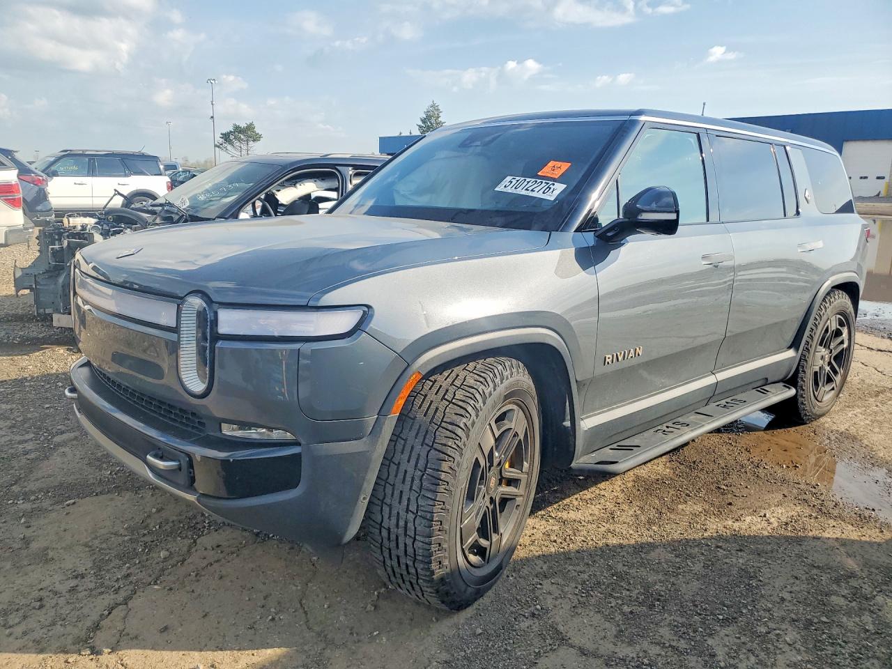 2023 Rivian R1S VIN 7PDSGABA3PN028350 — COPART salvage auction photo