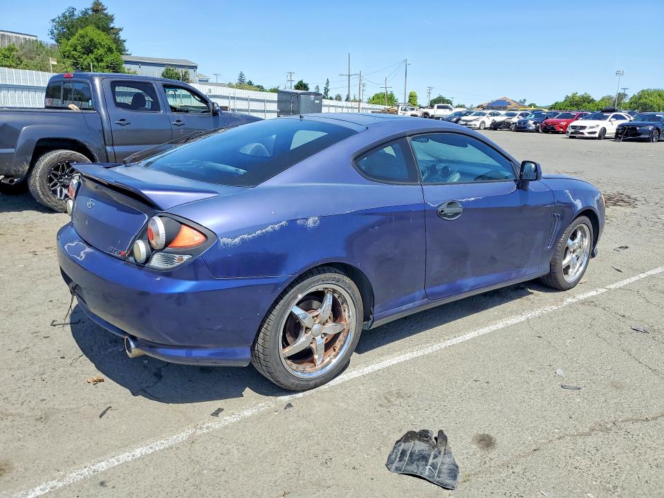 2003 Hyundai Tiburon VIN KMHHN65F03U017880 COPART salvage auction — ENGINE BURN, Ca - Salvage Certificate, sold $200 on 2026-07-10 (photo 3)