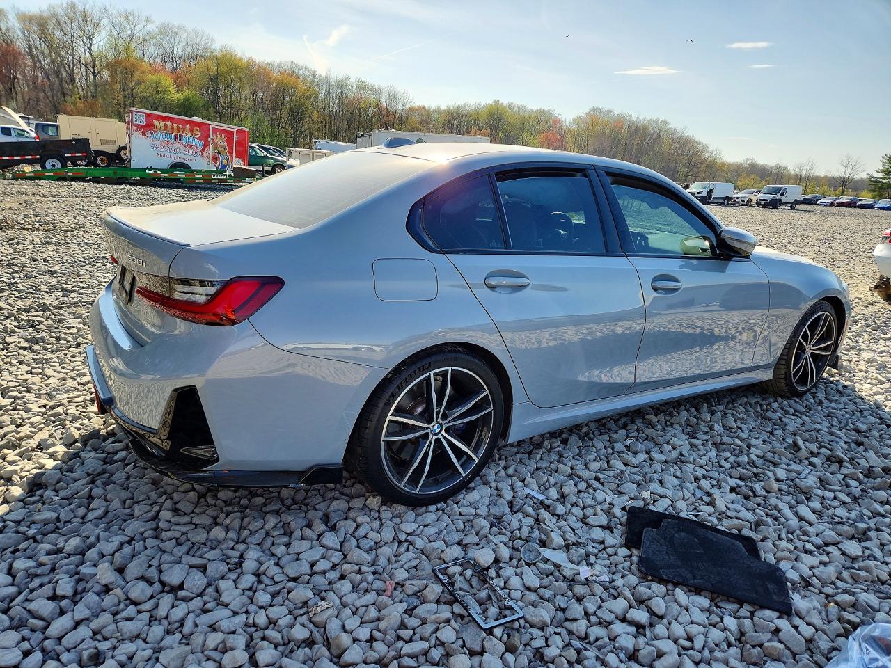2023 BMW 3 Series VIN 3MW89FF09P8D03052 COPART salvage auction — Side, ID - SALVAGE CERTIFICATE OF TITLE, sold $25,250 on 2026-08-12 (photo 3)