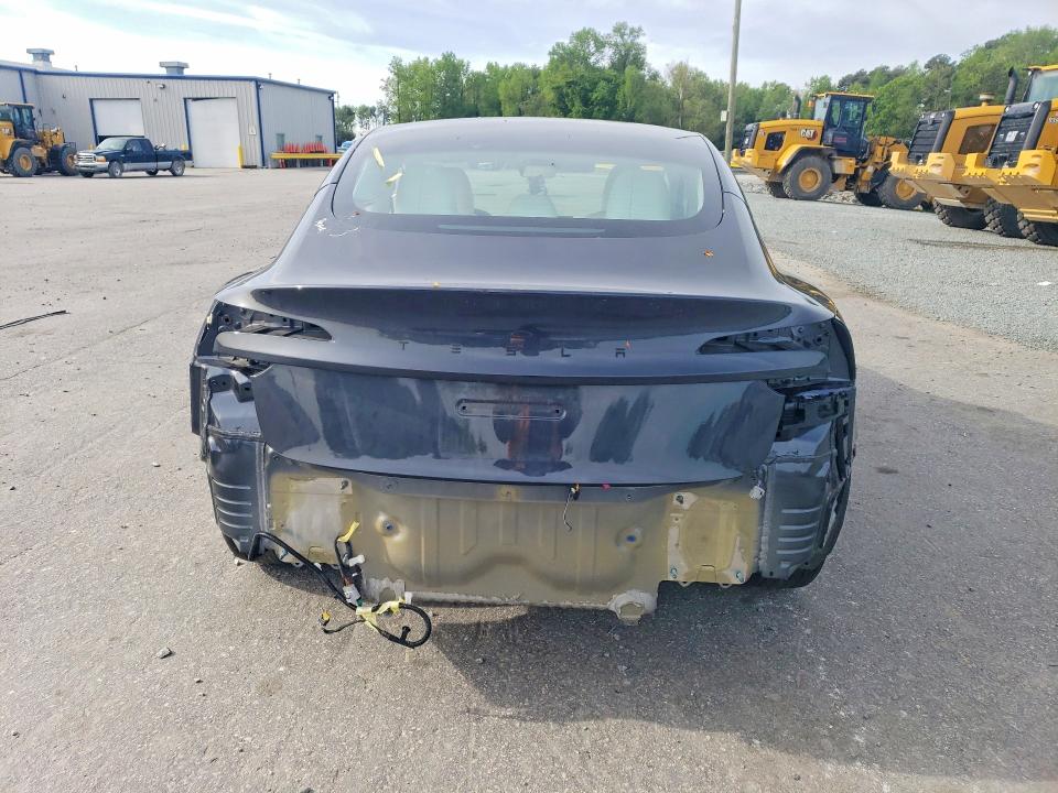 2026 Tesla Model 3 VIN 5YJ3E1EA4TF132559 COPART salvage auction — REAR END, Nc - Salvage Certificate Of Title, sold $13,000 on 2026-07-16 (photo 6)