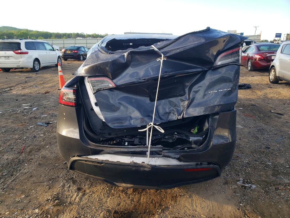 2023 Tesla Model y VIN 7SAYGAEE5PF606224 COPART salvage auction — REAR END, Va - Cert Of Title - Salvage, sold $12,800 on 2026-07-10 (photo 6)