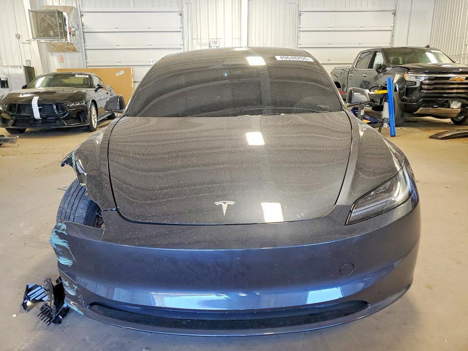 2025 Tesla Model 3 VIN 5YJ3E1EB7SF023312 COPART salvage auction — FRONT END, MN - CERT OF TITLE-SALVAGE, sold $14,200 on 2026-07-07 (photo 5)