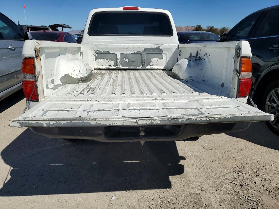 2002 Toyota Tacoma VIN 5TENL42N12Z047098 COPART salvage auction — VANDALISM, Nv - Certificate Of Title, sold $3,000 on 2026-07-23 (photo 6)