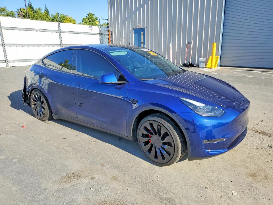 2024 Tesla Model y VIN 7SAYGDEF9RF154551 COPART salvage auction — UNDERCARRIAGE, CA, sold $12,500 on 2026-07-21 (photo 4)