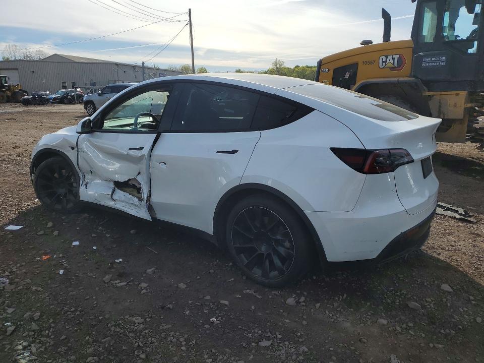 2023 Tesla Model y VIN 7SAYGDEE9PA025095 COPART salvage auction — SIDE, Salvage Title, sold $9,100 on 2026-07-15 (photo 2)