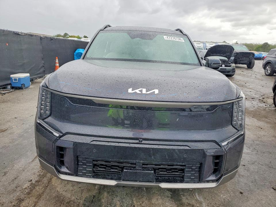 2025 Kia Ev9 VIN 5XYAEFS54SG002686 COPART salvage auction — SIDE, Fl - Cert Of Title Slvg Rebuildable, sold $11,200 on 2026-07-28 (photo 5)