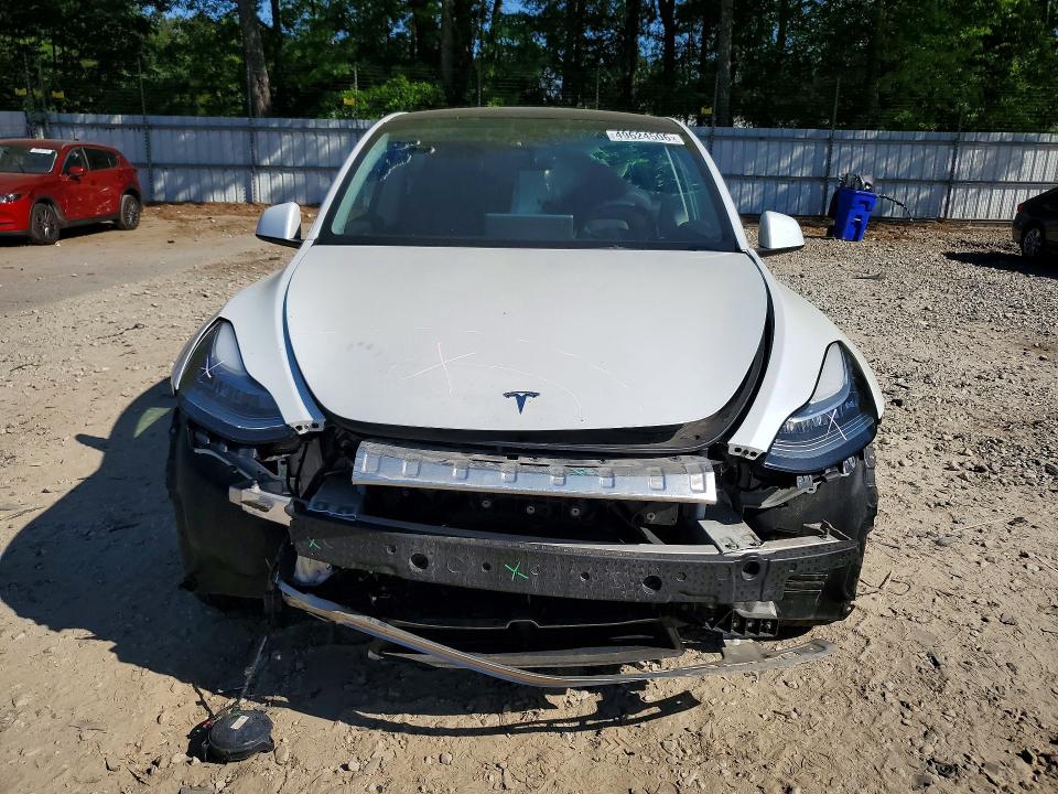 2023 Tesla Model y VIN 7SAYGDEE2PA078818 COPART salvage auction — FRONT END, Nc - Salvage Certificate Of Title, sold $9,800 on 2026-07-17 (photo 5)